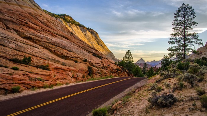 Scenic road through a rocky, mountainous landscape in the USA