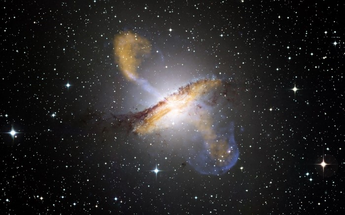 Galaxy with jets and stars in outer space