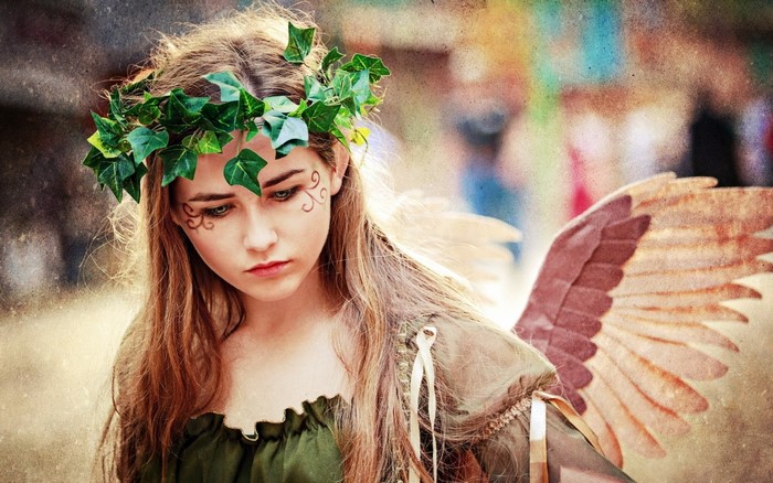 Girl with ivy crown and wings