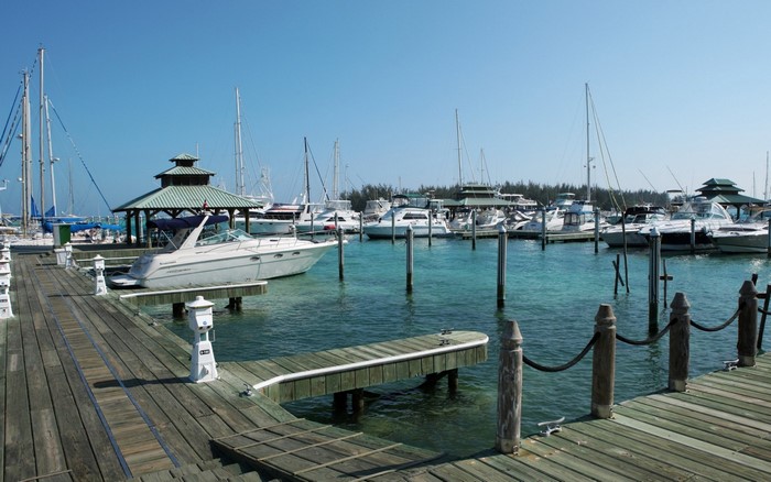 Boats docked in a marina on a clear day