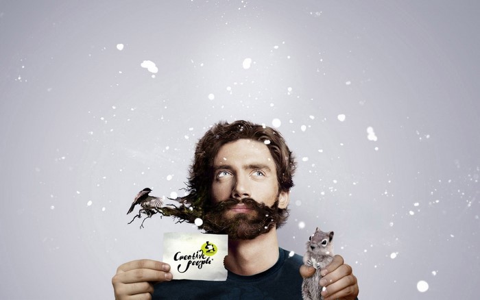 Man with creative beard and squirrel