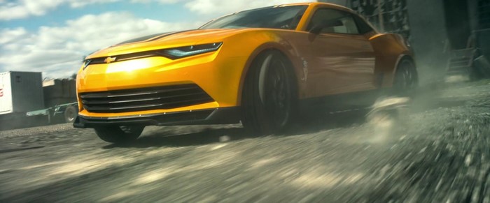 Bumblebee from Transformers driving a yellow Chevrolet Camaro