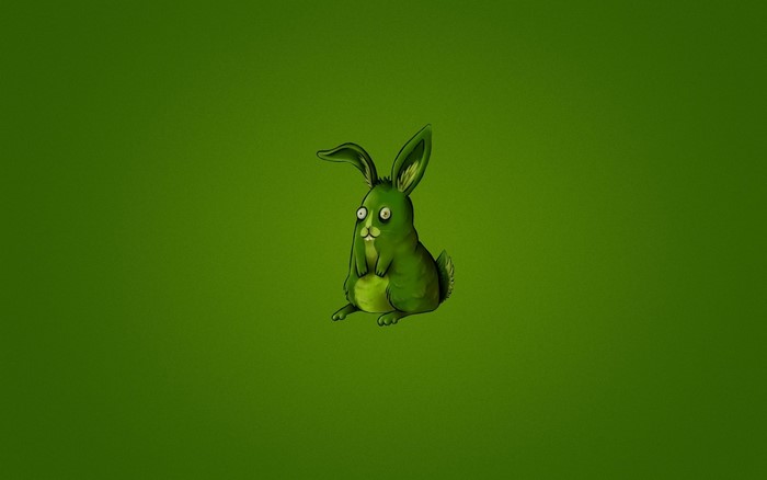 Green cartoon rabbit on a green background