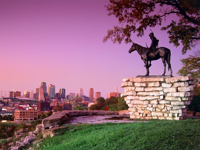 The Scout monument overlooking Kansas City skyline