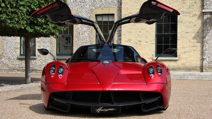 Red Pagani Huayra with doors open