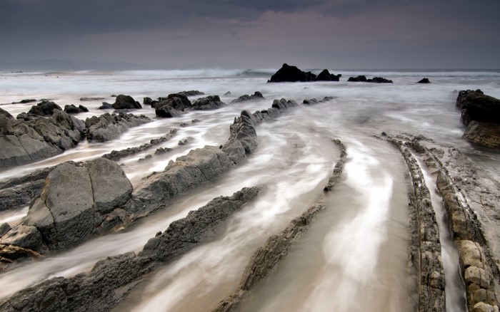 Rocky coastline with waves crashing on shore