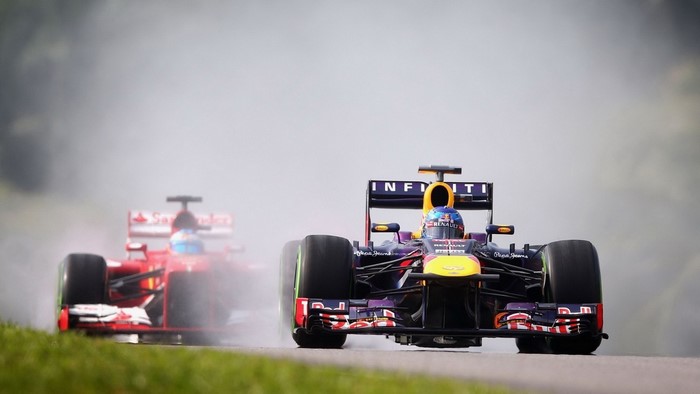 Formula 1 race with Red Bull and Ferrari cars