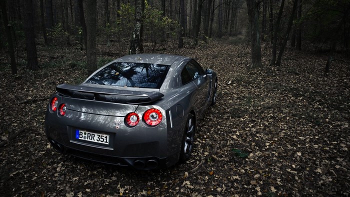 Nissan GT-R R35 in a dark forest