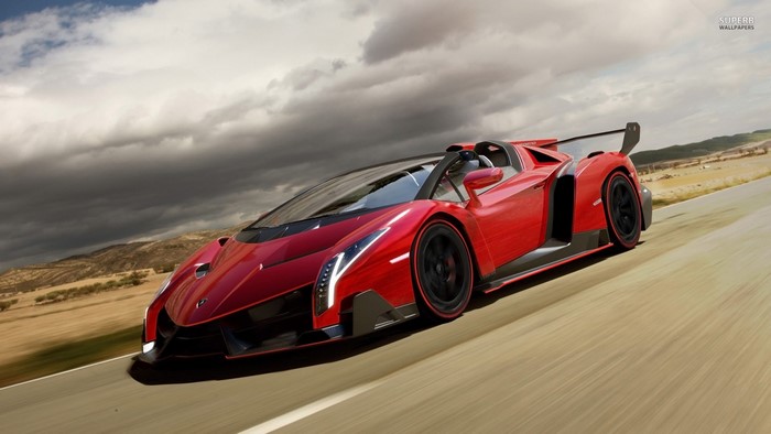 Red Lamborghini Veneno Roadster on Open Road