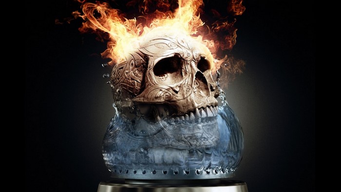 Skull on fire emerging from water