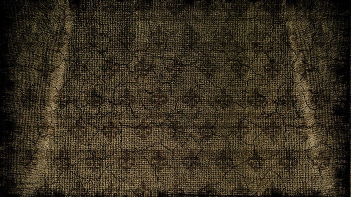 Cracked brown textured surface with dark edges