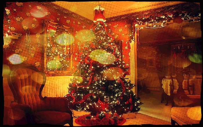 Christmas tree and armchair in a decorated room