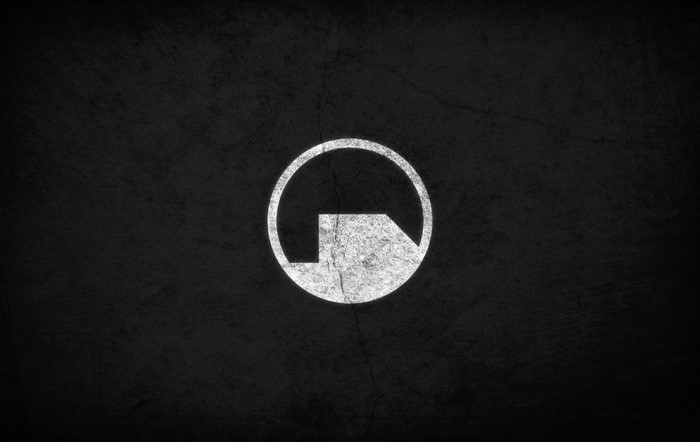 Black Mesa logo on a dark textured background