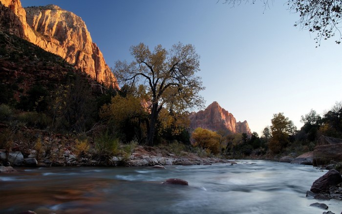 River flowing through a canyon at sunset