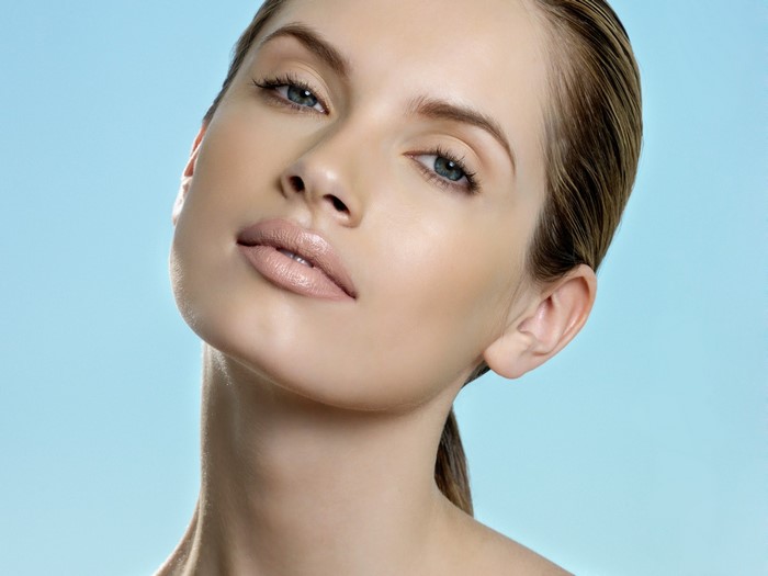Woman with brown hair and blue eyes