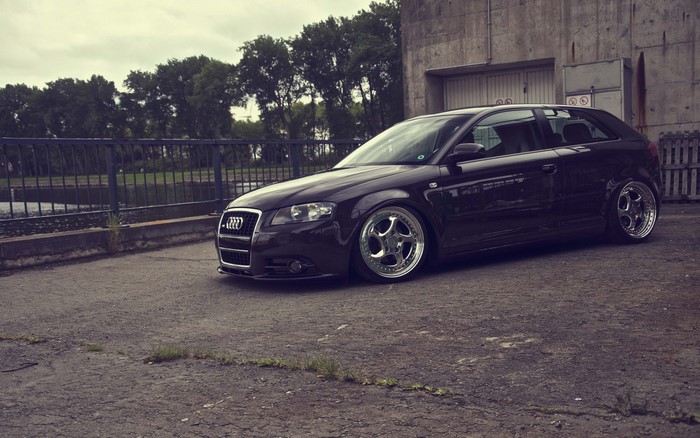 Black Audi A3 lowered on custom wheels