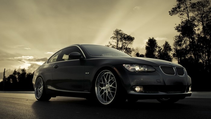 BMW Black Sports Car at Sunset