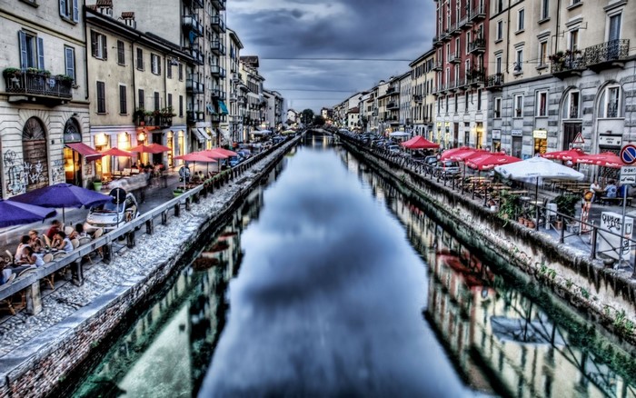 City canal with buildings and reflections