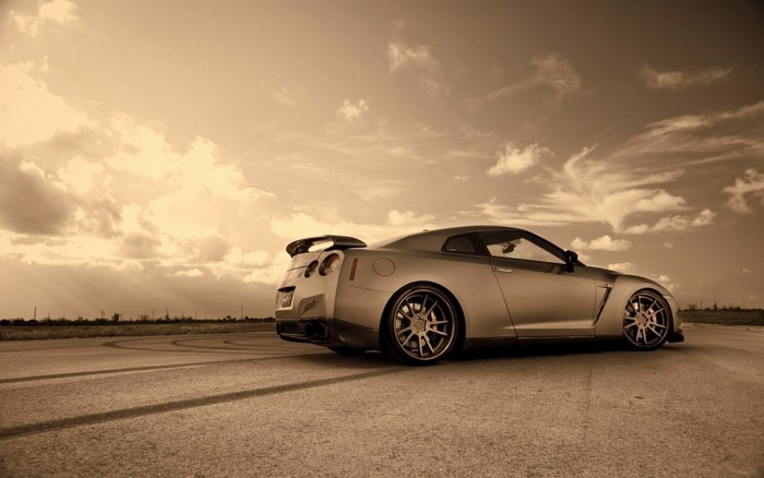 Silver Nissan GT-R R35 sports car on asphalt