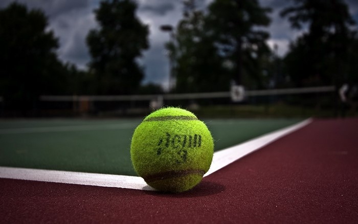 Tennis ball on a tennis court