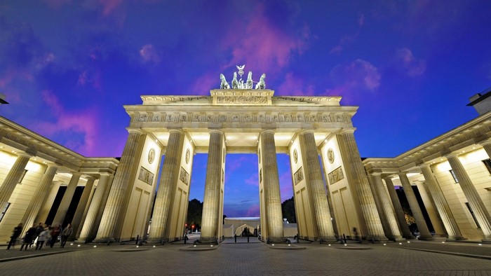 Brandenburg Gate at twilight with purple clouds