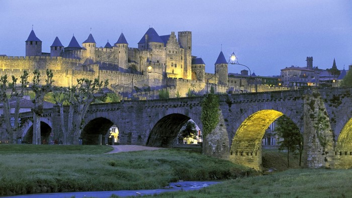 Carcassonne castle and bridge at dusk