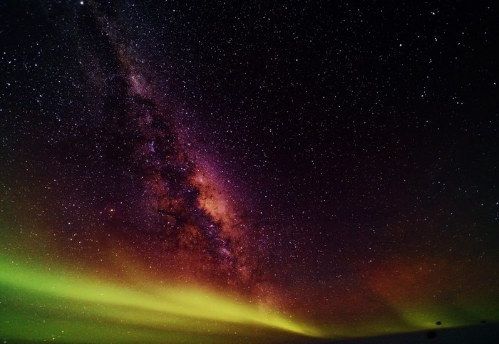 The Milky Way and Aurora Borealis in Outer Space