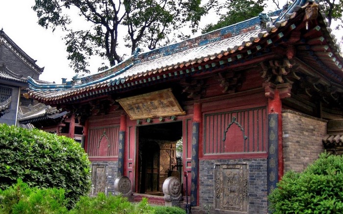 Traditional Chinese Temple Entrance with Greenery