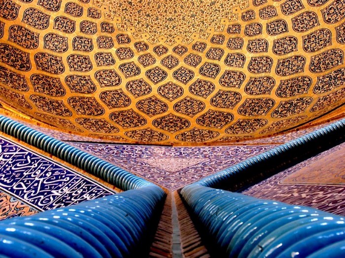 Islamic architecture with intricate tile patterns and dome
