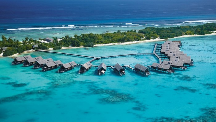 Overwater bungalows in a tropical lagoon