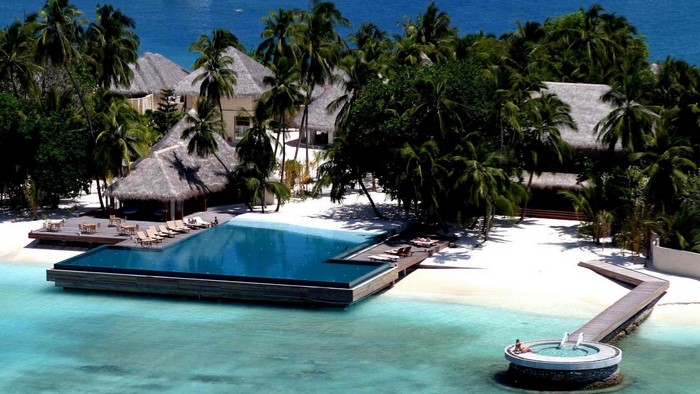 Tropical resort with infinity pool and overwater jacuzzi
