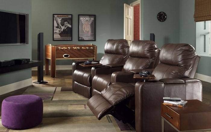 Home cinema with recliners and foosball table