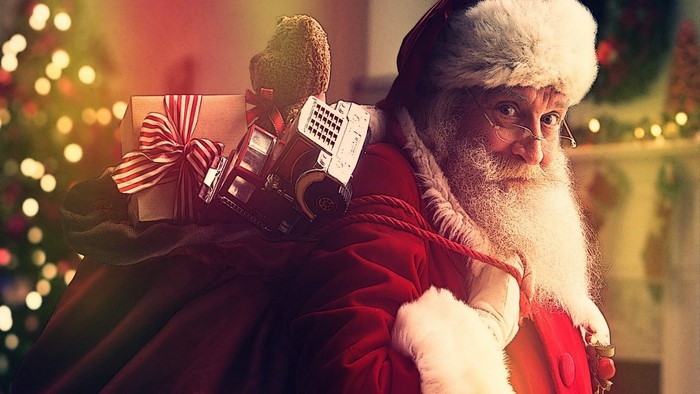 Santa Claus with a sack of toys and gifts