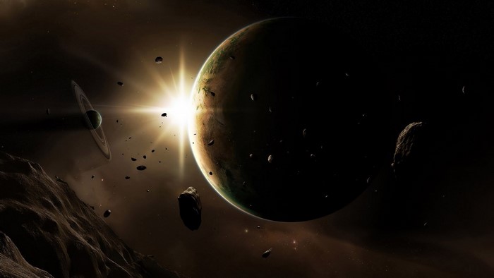 Planet with rings and asteroids in space