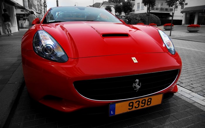 Red Ferrari California with license plate 9398