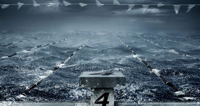 Swimming pool with stormy weather and starting block