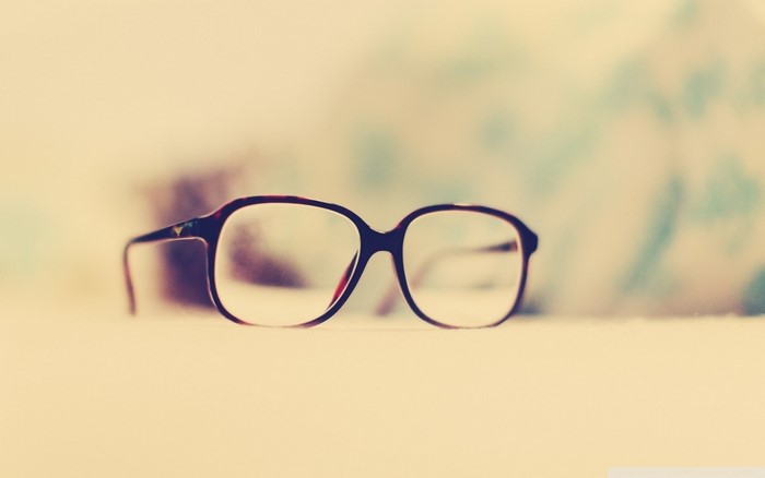 Close up of eyeglasses on a surface