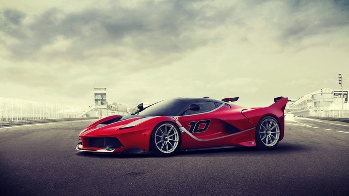 Red Ferrari FXX K Evo with number 10 on a race track