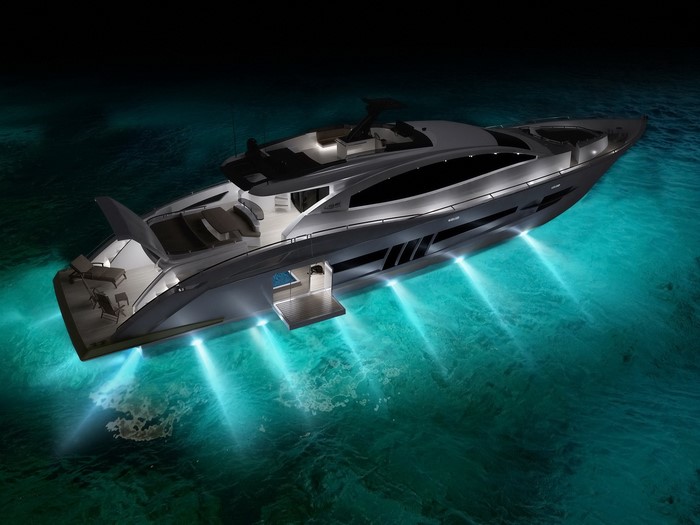 Luxury yacht illuminated at night in turquoise water