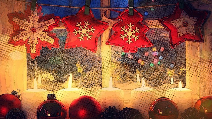 Christmas ornaments and candles on a window sill
