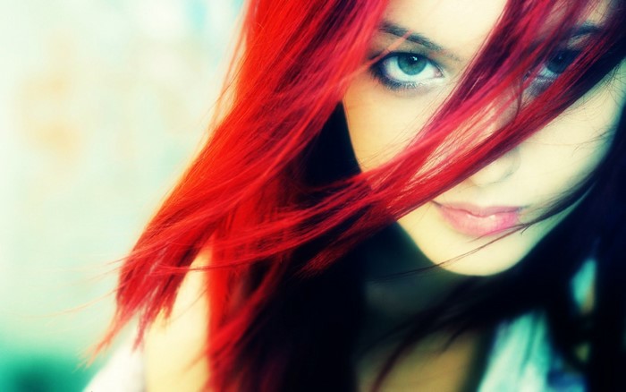 Close up portrait of a woman with red hair