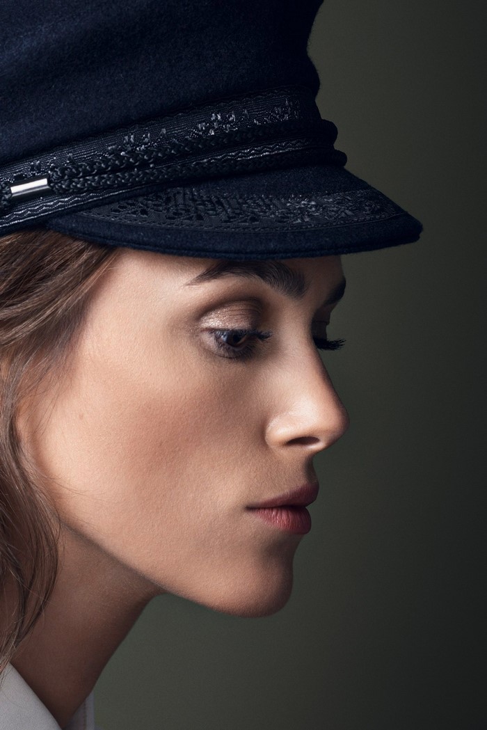 Keira Knightley wearing a black cap
