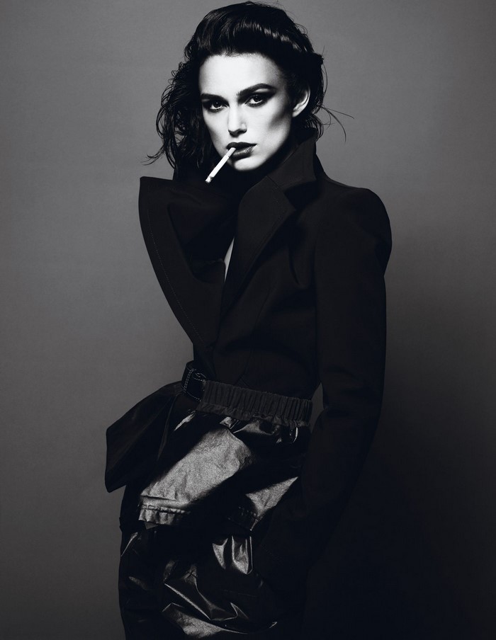 Keira Knightley smoking in a black outfit