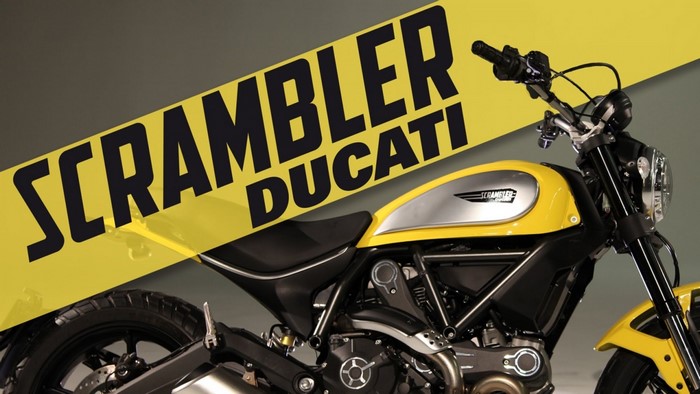 Yellow Ducati Scrambler motorcycle with text overlay