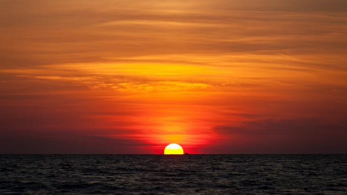 Sunset over the ocean with colorful sky
