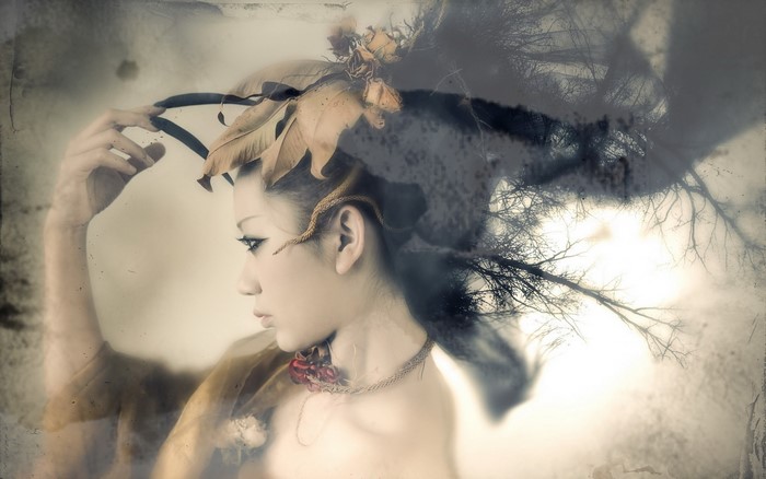 Woman with floral and branch headdress