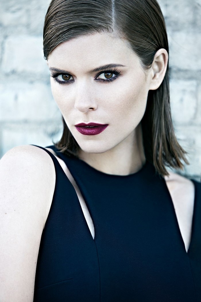 Kate Mara in a black dress