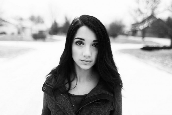 Black and white portrait of a woman in winter