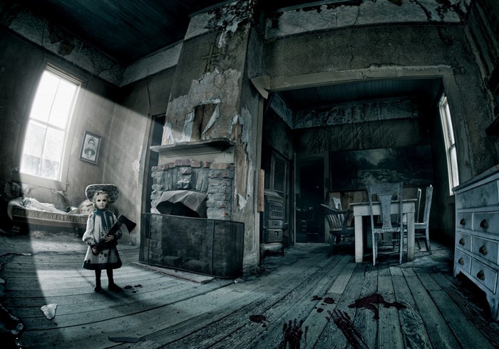 Creepy doll with axe in abandoned room