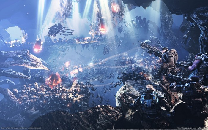 Gears of War 2 battle scene with soldiers and creatures
